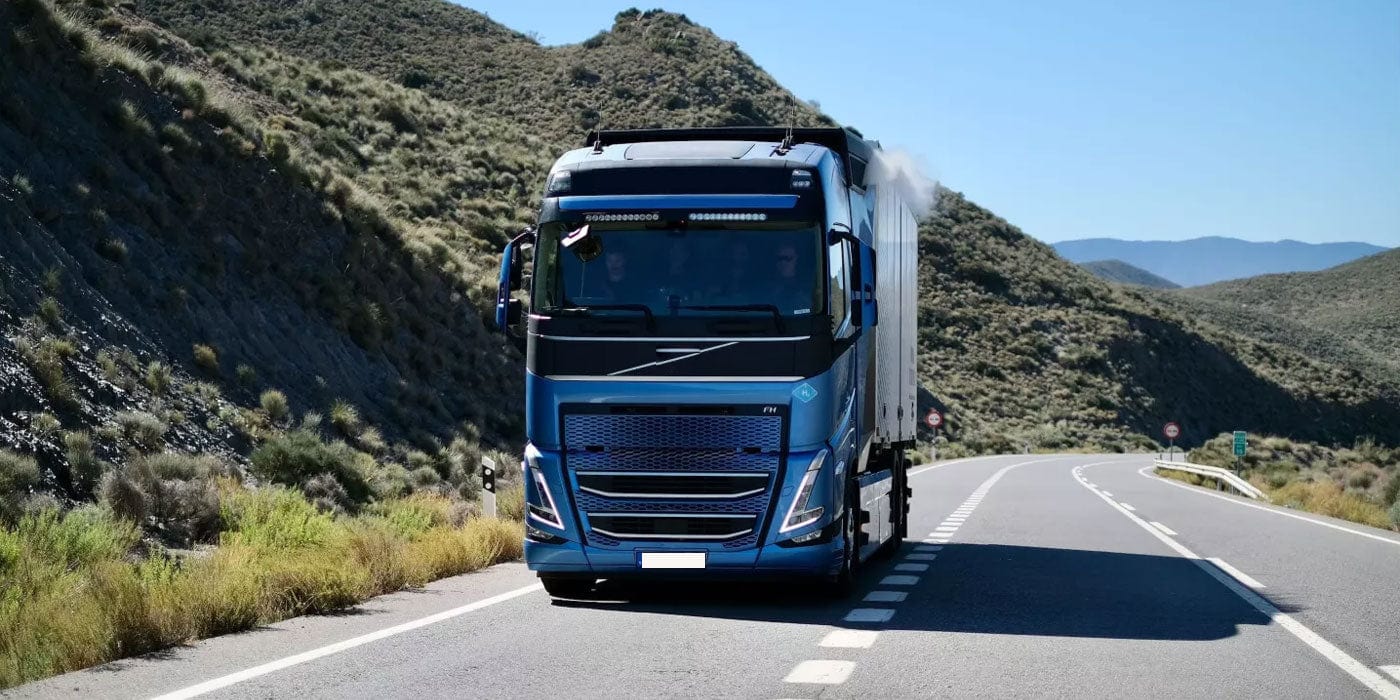 Volvo vehicle parked in a scenic area, showcasing its sleek design and powerful presence on a clear day